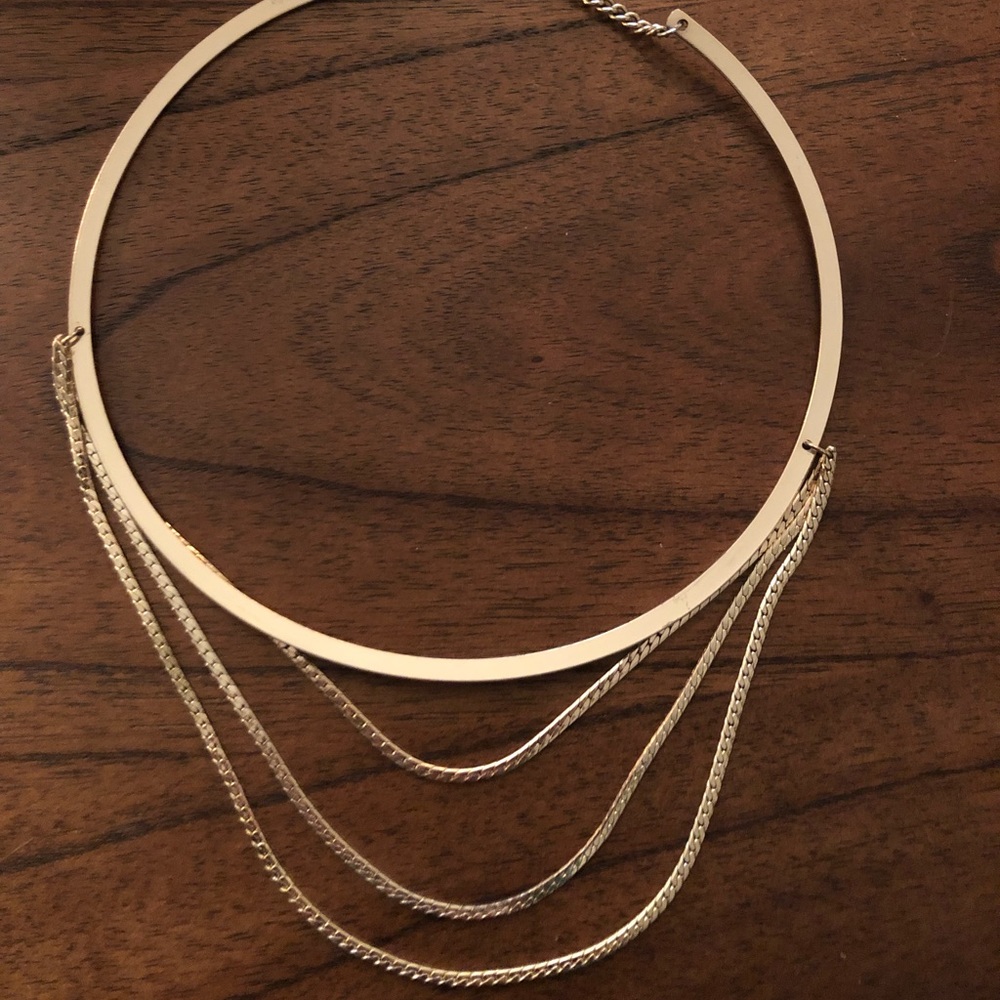 Gold multi layer necklace.